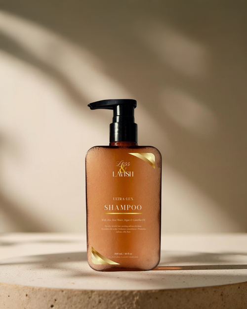 Less & Lavish shampoo bottle on a soft, modern neutral background